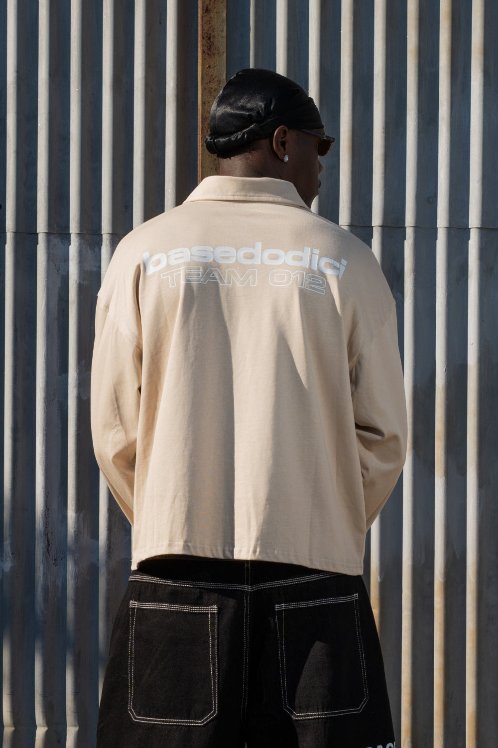 Polo Longsleeve "NEW MONEY" Team012 Beige/White