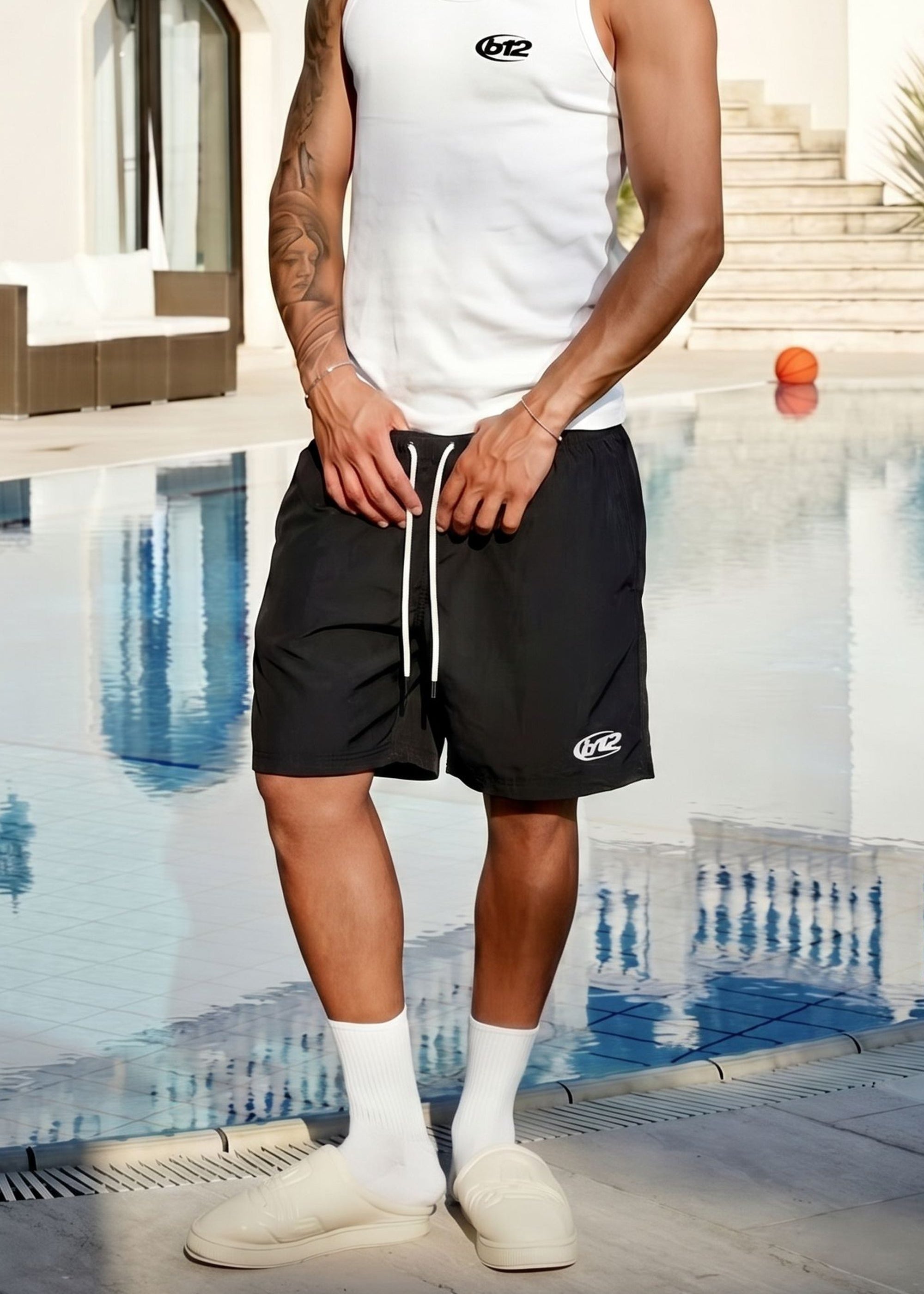 CROP_INDOSSATO_GEN-SwimShortLogoBlack.jpg